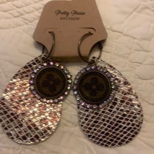 Large leather repurposed LV emblem on ear rings